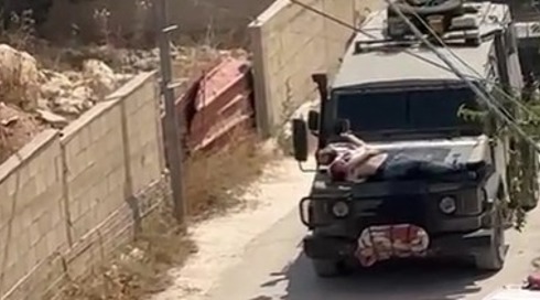 מחבל שניסה לברוח ממעצר נקשר למכסה מנוע; צה"ל: בניגוד לפקודות והנהלים