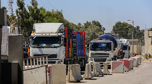 בישראל דנים בפיתוח מנגנון להכנסת סיוע "כחול לבן" לעזה