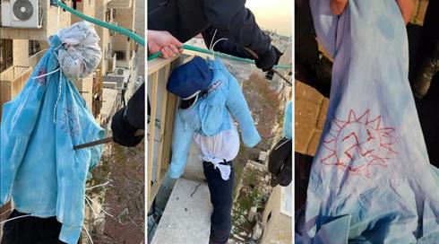 תיעוד: בובות של שוטרים עם צלבי קרס נתלו בבית שמש