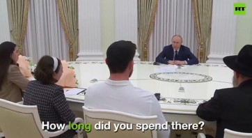 נשיא רוסיה ולדימיר פוטין נפגש עם פדוי השבי טרופנוב