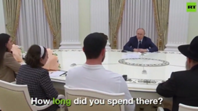 נשיא רוסיה ולדימיר פוטין נפגש עם פדוי השבי טרופנוב