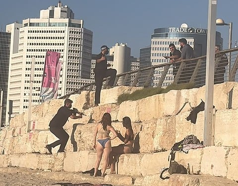 מאבטחים עם נשקים שלופים במקום בו הוקלטה הצהרת נתניהו צילום לפי סעיף 27 בחוק זכויות יוצרים