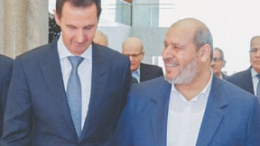 בשאר אסד עם חליל אל-חייה