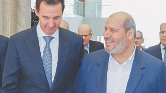 בשאר אסד עם חליל אל-חייה