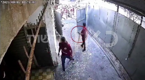 נעצר המהגר האריתראי שאחז באקדח במהומות בשבת