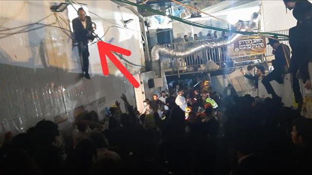 מתנדב ארגון "הכנסת אורחים רשב"י" יואל שלזינגר, שהציל חיי משתתפים בהילולה במירון
