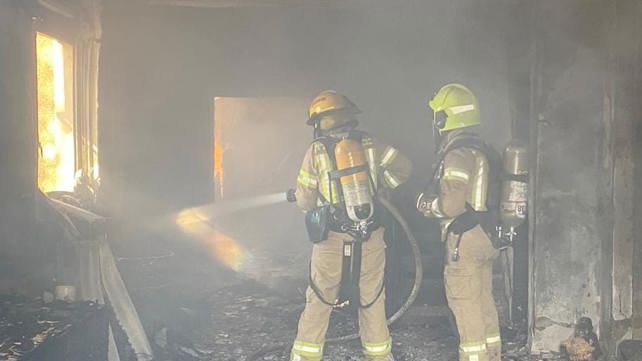 כיבוי שריפות עקב פגיעת נ"ט במבנים במטולה