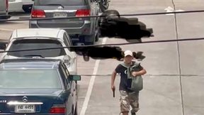 היורה בשוק בבנגקוק