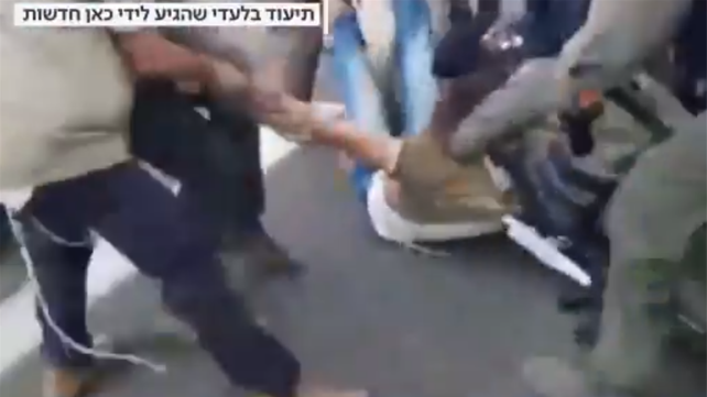 תיעוד נאשם בטרור יהודי בהפגנה