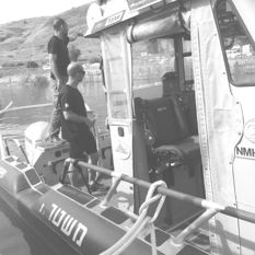 Police search boat on the Sea of Galilee