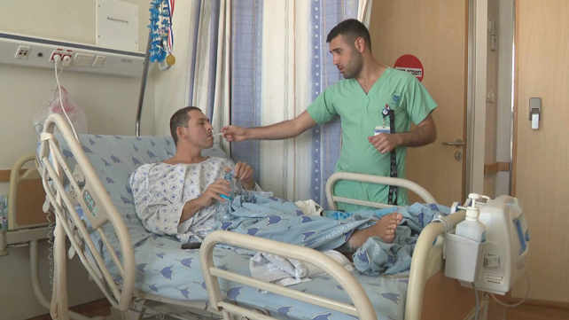 אלי שקולניק, מנופאי שנפצע קשה