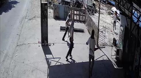 רעולי פנים פגעו בפלסטינים במוסך סמוך לשכם