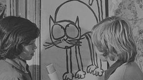 שני ילדים מסתכלים על ציור של חתול. 1.1.1976